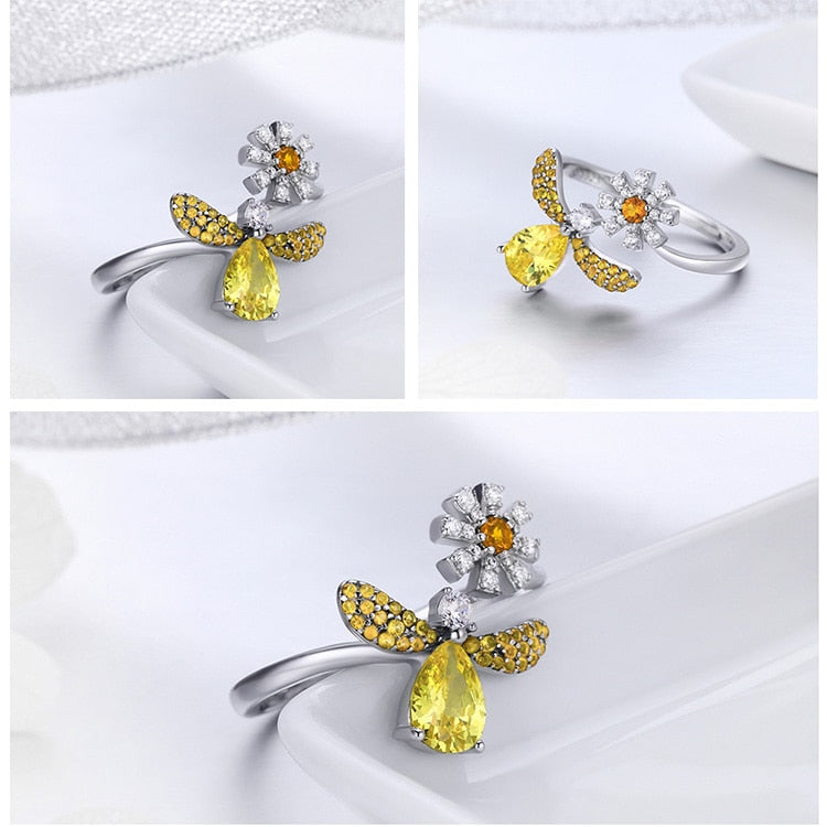 Insect and daisy ring